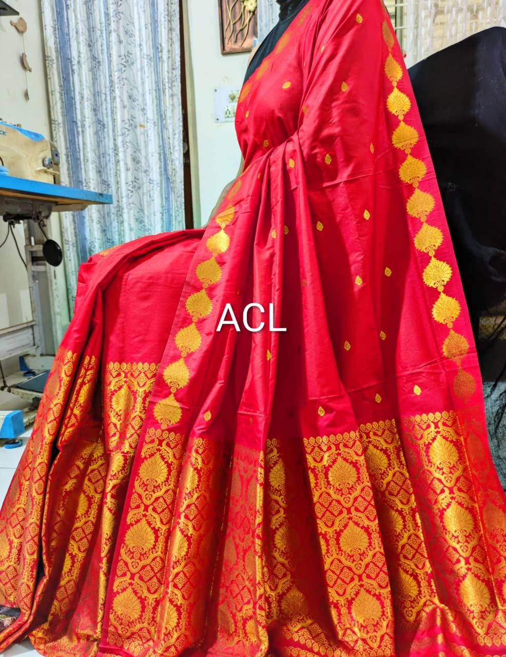 Red and gold handloom saree